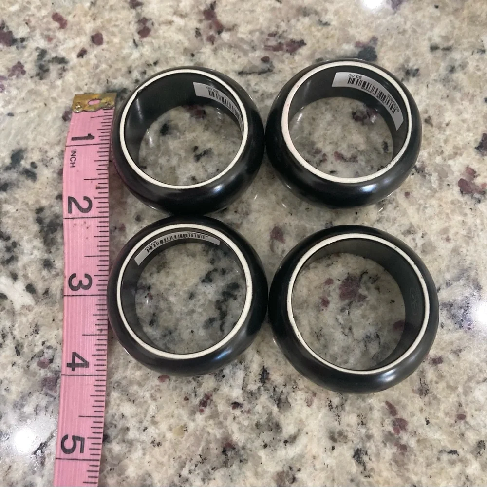 NWT Pier 1 Imports set of 4 black with white on one side ceramic napkin rings